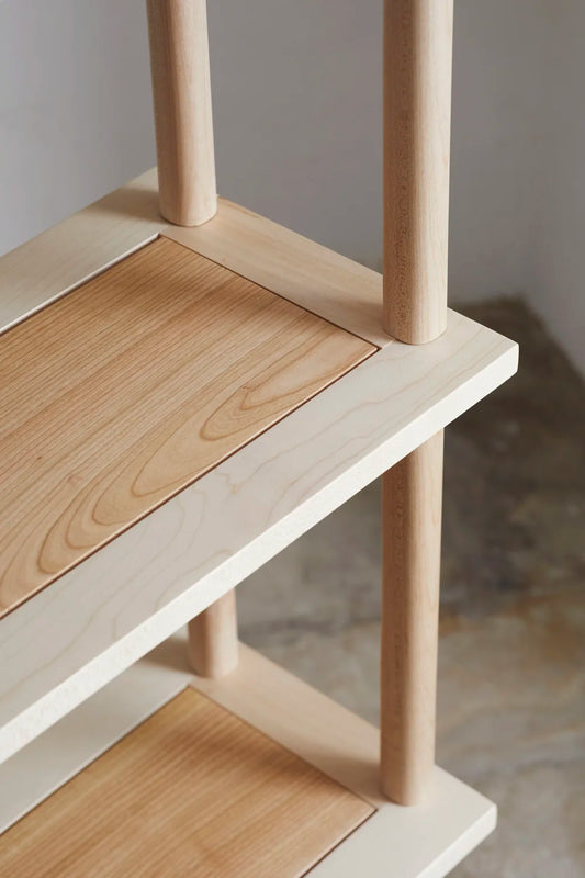 Panelled shelves by Jana Spence — the turned uprights standing proud at the top